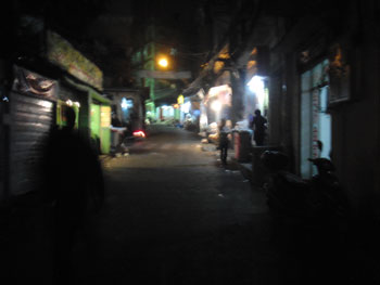 Narrow Chinese street at night